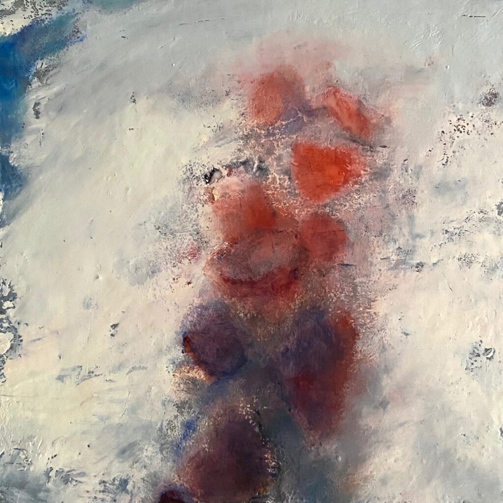Abstract landscape, a grey dusty background with red and purple splotches.